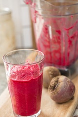a glass of beet smoothie