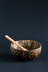 Coconut shell bowl , bowl made from coconut shell, black background