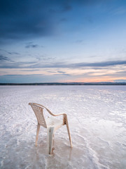 view of the salt mines with an old plastic chair sunning