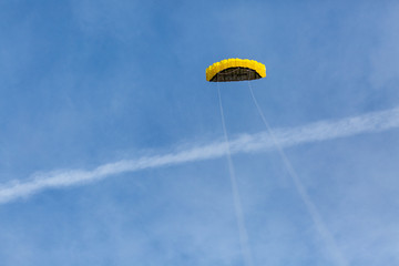paragliding in the blue sky