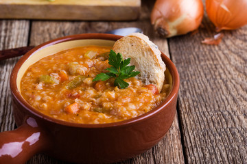 Healthy vegetarian barley soup with seasonal vegetables
