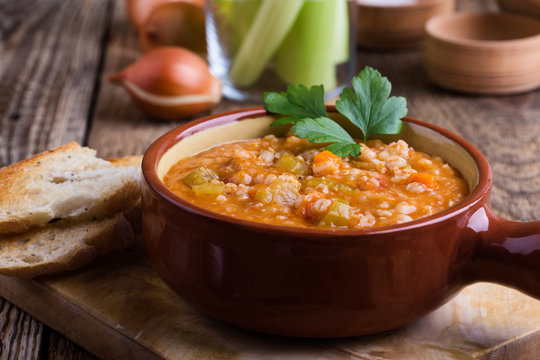 Healthy vegetarian barley soup with seasonal vegetables