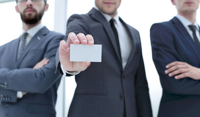 business team leader showing business card