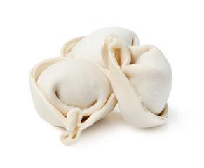 Several pieces of ravioli on a white isolated background. Close-up. Side view.