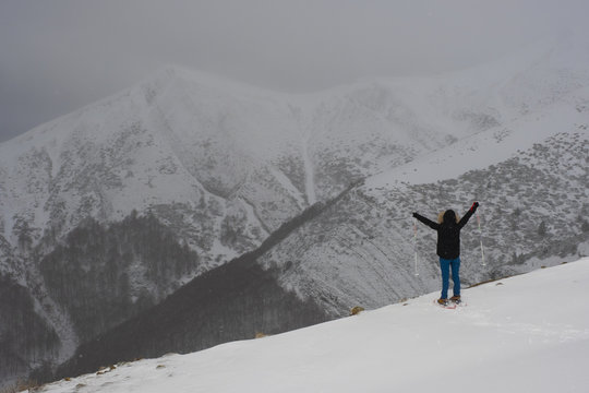 Lonely woman facing a challenge in the mountains, Pyrenees, Navarra