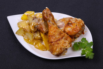 Roasted chicken legs with potato