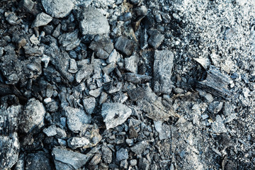 Ash and charcoal cooled after burning. Extinguished and cooled down fire made of wood. Background...