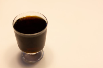 Coke in clear glass on a wooden table