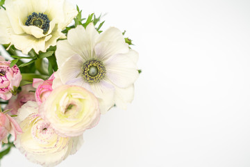 White Anemones and Pink Ranunculus Floral Flat Lay Background