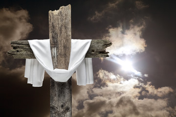 Easter cross on dramatic sky. He is risen concept. - obrazy, fototapety, plakaty