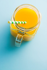 Pitcher of orange juice. Juice in glass.