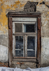 old wooden window in a wooden house