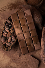 Chocolate bar, candy sweet, cacao beans and powder