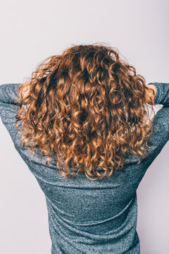 Woman's Head With Curly Brown Hair