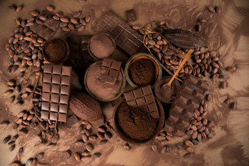 Chocolate bar, candy sweet, cacao beans and powder