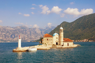 View of Bay of Kotor and Island of Our Lady of the Rocks ( Gospa od Skrpjela ) on sunny summer day....