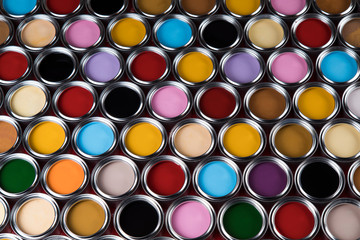 Full Buckets of rainbow colored oil paint