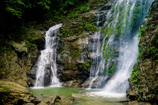 waterfall in the forest on the island of Mindoro, the Philippines