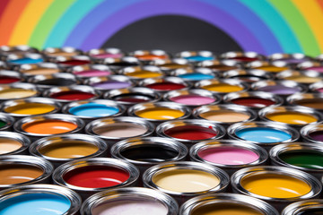Full Buckets of rainbow colored oil paint