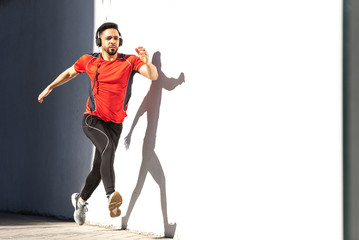 Man Runner Running on City.