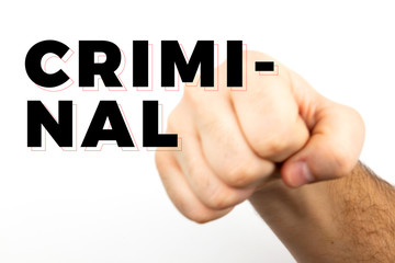 Blured Male hairy hand shows fist that symbolizes danger, crime, blow, fight isolated on white background and text 'criminal'