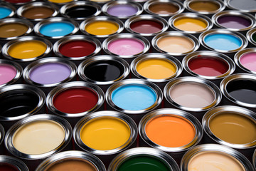 Group of tin metal cans with color paint
