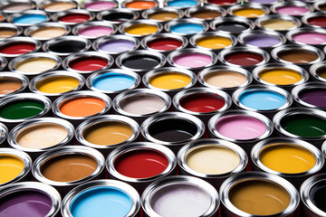 Full Buckets of rainbow colored oil paint