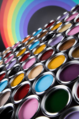 Full Buckets of rainbow colored oil paint