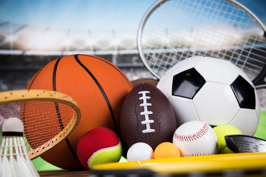 Sport equipment and balls, stadium background © Sebastian Duda