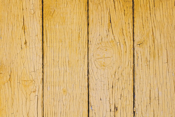 Fototapeta na wymiar Old yellow wooden boards. Close-up. Vertical view. Background. Texture.