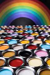 Group of tin metal cans with color paint