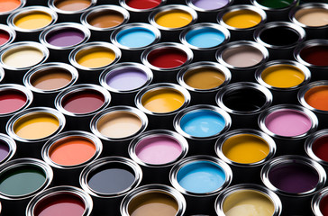 Fototapeta premium Full Buckets of rainbow colored oil paint