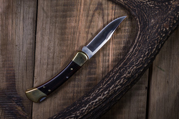 Knife with brass inserts. Knife with a copper handle.