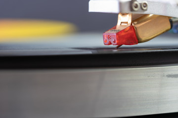 Fototapeta premium Vintage Record Player Needle Closeup On Album