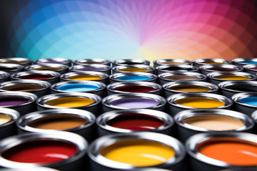 Full Buckets of rainbow colored oil paint