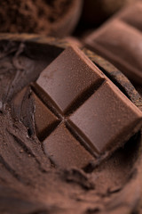 Dark homemade chocolate bars and cocoa