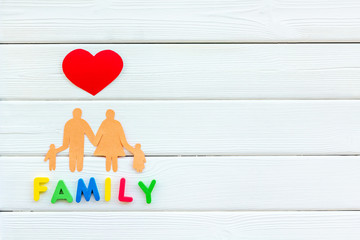 Family copy and adoption child concept on white wooden background top view mockup