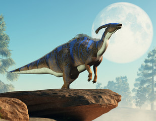 A parasaurolophus, a type of herbivorous ornithopod dinosaur of the hadrosaur family stands on two legs and calls out.  It stands out on a rocky cliff with the daytime moon behind it. 3D Rendering