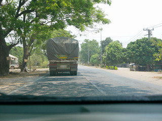 Driving behind big truck in Thailand - driver's point of view / perspective