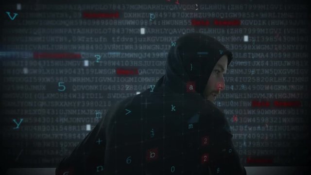 Hacker using computer in dark room with digital code 