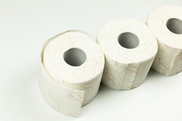 Toilet paper rolls on white background
