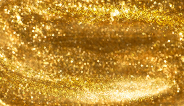 blurred gold glitter background