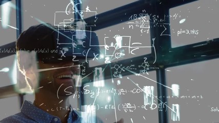 Businessman using virtual reality headset with mathematics symbols - Powered by Adobe