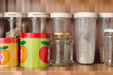 Kitchen canisters and tins with mixed light effects