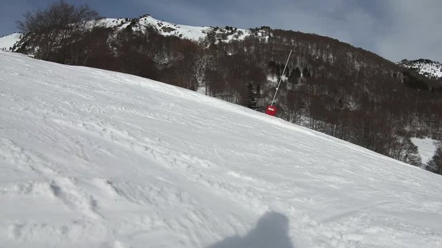 skier descending a ski slope in Pyrenean filmed with a action cam, Ariege in the southern of France