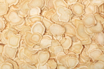 Chinese Herbal medicine - American Ginseng slices (Panax quinquefolius) isolated on white background