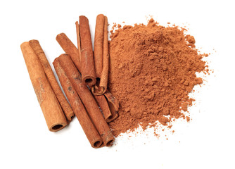 Cinnamon Sticks and Ground Cinnamon on a white background