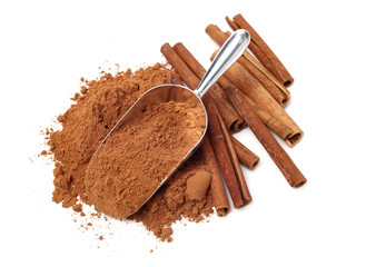 Cinnamon Sticks and Ground Cinnamon on a white background