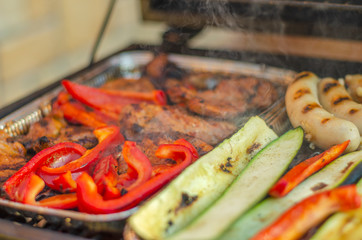 Meat and vegetables on the grill