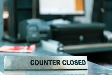 Cashier counter with closed sign